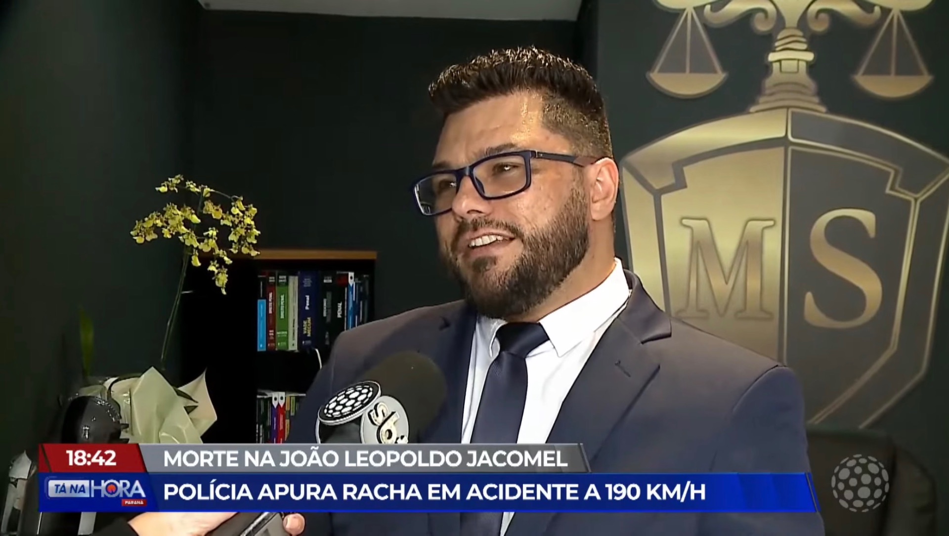 Marcel Silva durante entrevista para uma reportagem televisiva